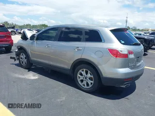 2011 Mazda CX-9 Sport with VIN JM3TB2BA3B0308508, listed as a IAAI auction lot 42517371 with 139,986 mi miles and . Bid and sale history available at DreamBid. Image 3.