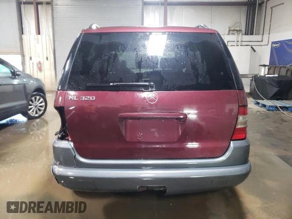 1998 Mercedes-Benz M-Class with VIN 4JGAB54E1WA034383, listed as a Copart auction lot 80363374 with 122,125 mi miles and Salvage Title. Bid and sale history available at carsss.com. Image 6.