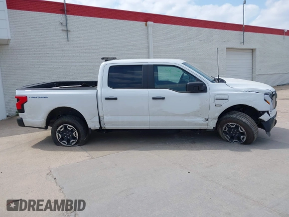 2023 Ford F-150 Lightning Pro with VIN 1FTVW1EL2PWG18764, listed as a IAAI auction lot 41908278 with 16,276 mi miles and . Bid and sale history available at DreamBid. Image 13.