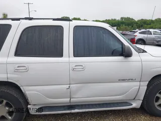 2002 GMC Yukon Denali z VIN 1GKEK63U62J248966, wystawiony jako IAAI lot #42366016 z przebiegiem 190 804 mil mil oraz . Historia ofert i sprzedaży dostępna na DreamBid. Obrazek 13.