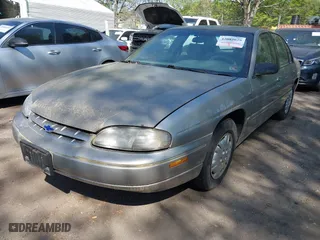 1999 Chevrolet Lumina with VIN 2G1WL52M3X9189217, listed as a IAAI auction lot 42082029 with 211,500 mi miles. Bid and sale history available at carsss.com. Image 2.