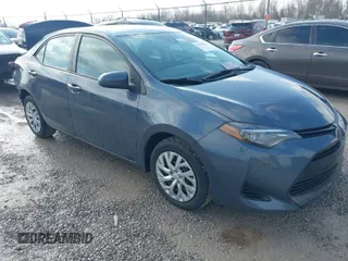 2018 Toyota Corolla L z VIN 5YFBURHE3JP828648, wystawiony jako IAAI lot #41675529 z przebiegiem 65 315 mil mil oraz . Historia ofert i sprzedaży dostępna na DreamBid. Obrazek 1.