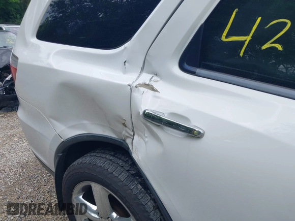 2013 Dodge Durango Citadel with VIN 1C4RDJEGXDC559700, listed as a IAAI auction lot 42468665 with 138,967 mi miles and . Bid and sale history available at DreamBid. Image 14.