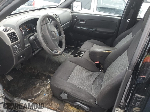 2011 GMC Canyon SLE1 with VIN 1GTH6MFE1B8124553, listed as a Copart auction lot 46122415 with 176,763 mi miles and Salvage title. Bid and sale history available at DreamBid. Image 7.