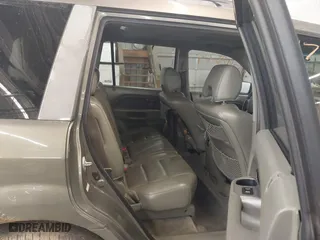 2007 Honda Pilot EX-L with VIN 2HKYF18767H538207, listed as a IAAI auction lot 41747624 with 214,026 mi miles. Bid and sale history available at carsss.com. Image 8.