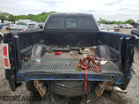2010 Ford F-150 XL with VIN 1FTEX1E8XAFB69365, listed as a Copart auction lot 59037645 with 137,065 mi miles and Salvage title. Bid and sale history available at DreamBid. Image 6.