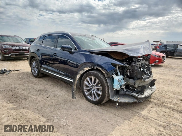 2023 Mazda CX-9 Carbon Edition with VIN JM3TCBDY1P0633964, listed as a Copart auction lot 60750015 with 34,657 mi miles and Salvage title. Bid and sale history available at DreamBid. Image 4.