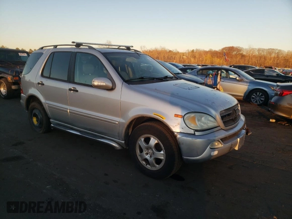 2002 Mercedes-Benz M-Class with VIN 4JGAB54E32A312131, listed as a Copart auction lot 80490084 with 165,365 mi miles and Salvage Title. Bid and sale history available at carsss.com. Image 4.