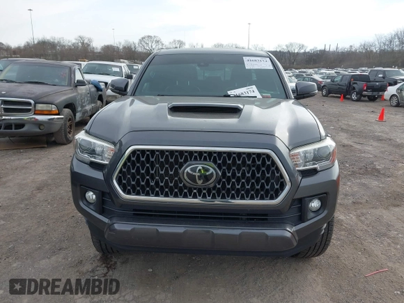 2018 Toyota Tacoma SR with VIN 3TMCZ5AN0JM150540, listed as a IAAI auction lot 41683174 with 78,553 mi miles and . Bid and sale history available at DreamBid. Image 12.