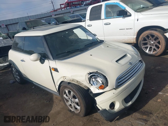 2007 MINI Hardtop with VIN WMWMF33587TT52466, listed as a IAAI auction lot 41964371 with 129,842 mi miles and . Bid and sale history available at DreamBid. Image 1.