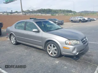 2003 Nissan Maxima GLE z VIN JN1DA31A23T436412, wystawiony jako IAAI lot #42223773 z przebiegiem 120 844 mil mil oraz . Historia ofert i sprzedaży dostępna na DreamBid. Obrazek 1.