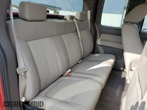 2009 Ford F-150 STX with VIN 1FTRX12869FB02974, listed as a Copart auction lot 52781725 with 130,583 mi miles and Salvage title. Bid and sale history available at DreamBid. Image 10.