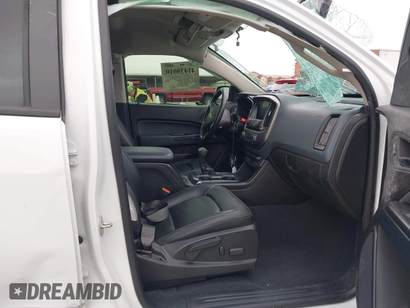 2019 Chevrolet Colorado 4WD Z71 z VIN 1GCGTDEN3K1317883, wystawiony jako IAAI lot #41439010 z przebiegiem 34 306 mil mil oraz . Historia ofert i sprzedaży dostępna na DreamBid. Obrazek 5.