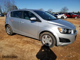 2014 Chevrolet Sonic LS with VIN 1G1JA6SH9E4164380, listed as a Copart auction lot 41633345 with 56,862 mi miles and Salvage Title. Bid and sale history available at carsss.com. Image 4.