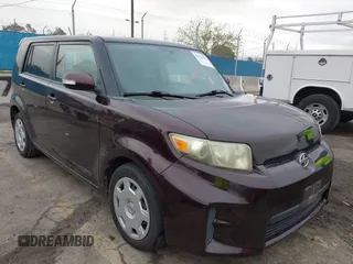 2012 Scion xB z VIN JTLZE4FE5CJ008133, wystawiony jako IAAI lot #41712937 z przebiegiem 90 236 mil mil oraz . Historia ofert i sprzedaży dostępna na DreamBid. Obrazek 1.