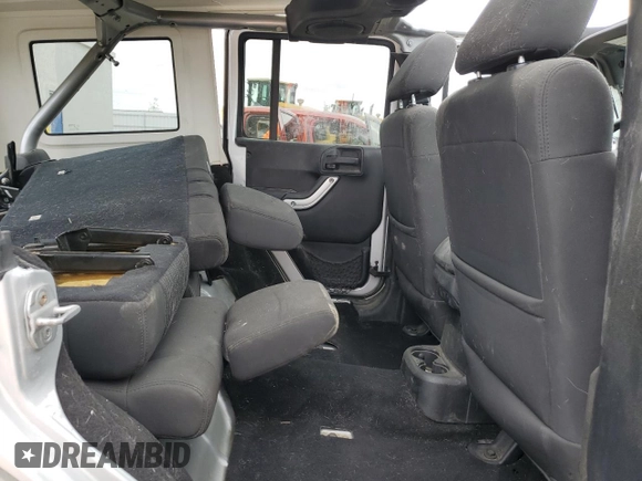 2011 Jeep Wrangler Unlimited Rubicon with VIN 1J4BA6H13BL537964, listed as a Copart auction lot 57532725 with 71,498 mi miles and Salvage title. Bid and sale history available at DreamBid. Image 10.