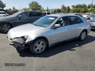 2004 Honda Accord LX with VIN JHMCM56334C036395, listed as a Copart auction lot 60715175 with 147,067 mi miles and Salvage title. Bid and sale history available at DreamBid. Image 1.