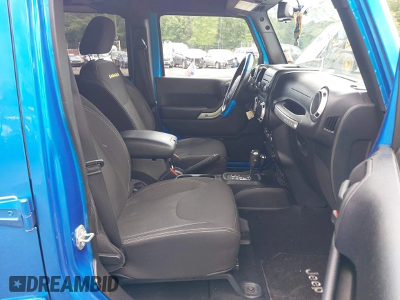 2015 Jeep Wrangler Unlimited Sahara with VIN 1C4BJWEG4FL677879, listed as a IAAI auction lot 42676097 with 85,821 mi miles and . Bid and sale history available at DreamBid. Image 5.