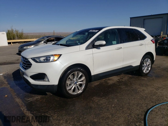 2021 Ford Edge Titanium with VIN 2FMPK4K91MBA27073, listed as a Copart auction lot 51776575 with 113,559 mi miles and Clean title. Bid and sale history available at DreamBid. Image 1.