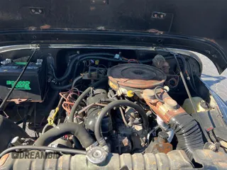 1986 Jeep CJ z VIN 1JCCM87A8GT005257, wystawiony jako Copart lot #73515554 z przebiegiem 51 993 mil mil oraz Tytuł czysty. Historia ofert i sprzedaży dostępna na DreamBid. Obrazek 7.