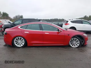 2016 Tesla Model S 90D with VIN 5YJSA1E28GF150889, listed as a IAAI auction lot 41958931 with 24,090 mi miles and . Bid and sale history available at DreamBid. Image 13.