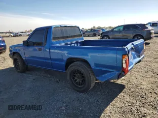 1992 Mitsubishi Mighty Max z VIN JA7FL24W9NP015815, wystawiony jako Copart lot #79803754 z przebiegiem 170 580 mil mil oraz Szkody całkowita. Historia ofert i sprzedaży dostępna na DreamBid. Obrazek 2.