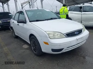 2007 Ford Focus S z VIN 1FAHP34N47W204433, wystawiony jako IAAI lot #41808035 z przebiegiem 168 756 mil mil oraz . Historia ofert i sprzedaży dostępna na DreamBid. Obrazek 1.