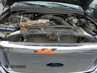 2000 Ford F-250 XL with VIN 1FTNX21L5YEC66604, listed as a Copart auction lot 51754055 with 167,798 mi miles and Salvage title. Bid and sale history available at DreamBid. Image 11.