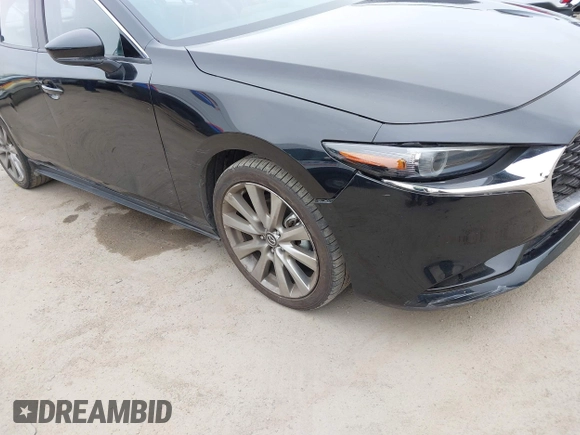 2021 Mazda 3 Premium with VIN JM1BPADL4M1329041, listed as a IAAI auction lot 42291604 with 93,248 mi miles and . Bid and sale history available at DreamBid. Image 18.