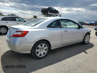 2009 Honda Civic Cpe LX with VIN 2HGFG12629H512043, listed as a Copart auction lot 52308725 with 134,645 mi miles and Salvage Title. Bid and sale history available at carsss.com. Image 3.