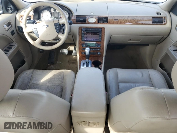 2006 Ford Five Hundred Limited with VIN 1FAHP28176G152533, listed as a Copart auction lot 57301935 with 242,981 mi miles and Salvage title. Bid and sale history available at DreamBid. Image 8.