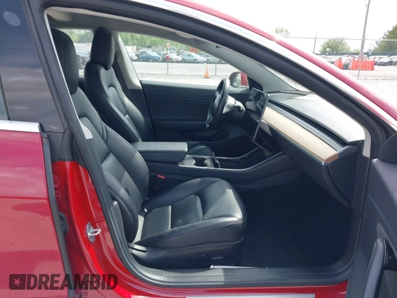 2018 Tesla Model 3 Long Range Battery with VIN 5YJ3E1EA8JF031683, listed as a IAAI auction lot 39275313 with 136,939 mi miles and . Bid and sale history available at DreamBid. Image 5.