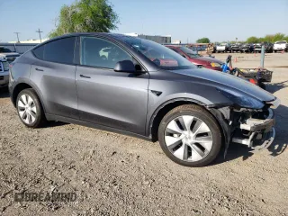 2023 Tesla Model Y z VIN 7SAYGDED8PF958836, wystawiony jako Copart lot #48893455 z przebiegiem 19 040 mil mil oraz Szkoda całkowita • Salvage title. Historia ofert i sprzedaży dostępna na DreamBid. Obrazek 4.