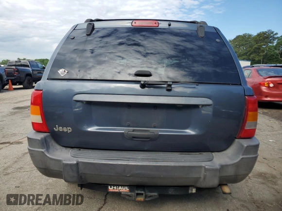 2004 Jeep Grand Cherokee Laredo with VIN 1J4GX48S24C216941, listed as a Copart auction lot 55584785 with 279,710 mi miles and Salvage title. Bid and sale history available at DreamBid. Image 6.