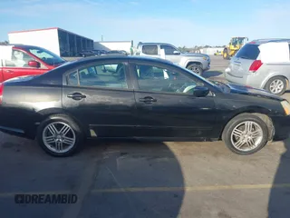 2004 Mitsubishi Galant ES with VIN 4A3AB36F74E077627, listed as a IAAI auction lot 41734910 with 196,299 mi miles. Bid and sale history available at carsss.com. Image 13.