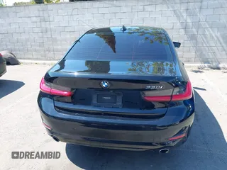 2021 BMW 3 Series 330i z VIN 3MW5R1J02M8B67582, wystawiony jako IAAI lot #41880589 z przebiegiem 31 915 mil mil oraz . Historia ofert i sprzedaży dostępna na DreamBid. Obrazek 16.