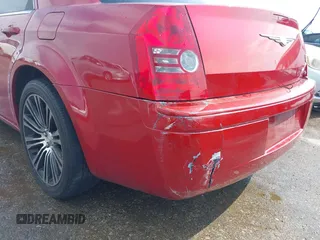 2010 Chrysler 300 with VIN 2C3CA2CV3AH279913, listed as a IAAI auction lot 40731536 with 143,969 mi miles. Bid and sale history available at carsss.com. Image 13.