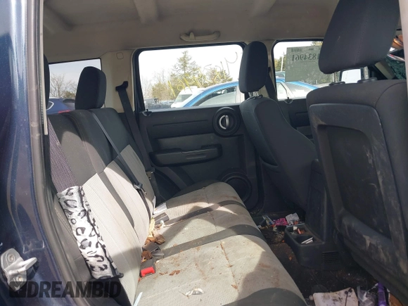 2008 Dodge Nitro SXT with VIN 1D8GU28K28W189765, listed as a IAAI auction lot 41834961 with 214,837 mi miles. Bid and sale history available at carsss.com. Image 8.