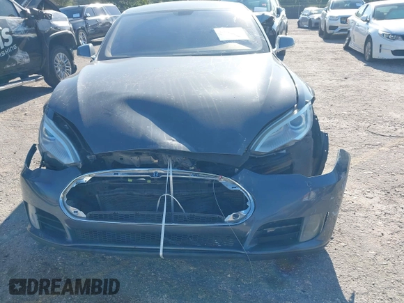 2014 Tesla Model S 60 with VIN 5YJSA1H1XEFP31911, listed as a IAAI auction lot 42029215 with Not Provided miles and . Bid and sale history available at DreamBid. Image 12.