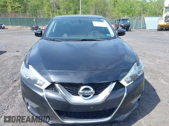 2018 Nissan Maxima SV with VIN 1N4AA6APXJC369633, listed as a IAAI auction lot 42256821 with 67,819 mi miles and . Bid and sale history available at DreamBid. Image 12.