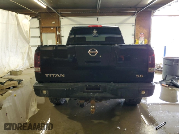 2006 Nissan Titan SE with VIN 1N6BA06A96N567659, listed as a Copart auction lot 61928495 with 190,594 mi miles and Salvage title. Bid and sale history available at DreamBid. Image 6.