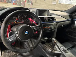 2014 BMW 4 Series 428i xDrive with VIN WBA3N5C56EF716258, listed as a Copart auction lot 52916185 with 106,512 mi miles and Salvage Title. Bid and sale history available at DreamBid. Image 9.