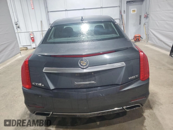 2014 Cadillac CTS Luxury AWD z VIN 1G6AX5SX5E0185132, wystawiony jako Copart lot #52292465 z przebiegiem 69 344 mil mil oraz Szkoda całkowita • Salvage title. Historia ofert i sprzedaży dostępna na DreamBid. Obrazek 6.