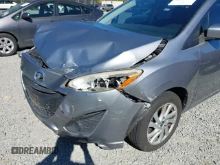 2014 Mazda 5 Sport z VIN JM1CW2BL0E0172678, wystawiony jako IAAI lot #42192057 z przebiegiem 89 848 mil mil oraz . Historia ofert i sprzedaży dostępna na DreamBid. Obrazek 6.