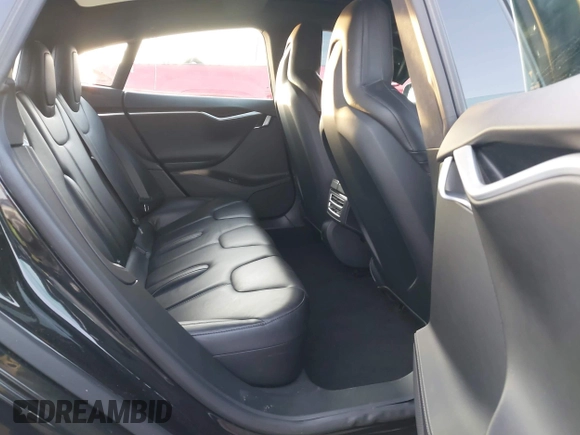 2016 Tesla Model S 90D z VIN 5YJSA1E26GF156108, wystawiony jako IAAI lot #41453148 z przebiegiem 74 717 mil mil oraz . Historia ofert i sprzedaży dostępna na DreamBid. Obrazek 8.