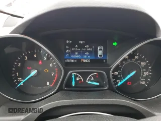 2018 Ford Escape SE z VIN 1FMCU9GD7JUB01668, wystawiony jako Copart lot #57038675 z przebiegiem 70 780 mil mil oraz Szkoda całkowita • Salvage title. Historia ofert i sprzedaży dostępna na DreamBid. Obrazek 9.