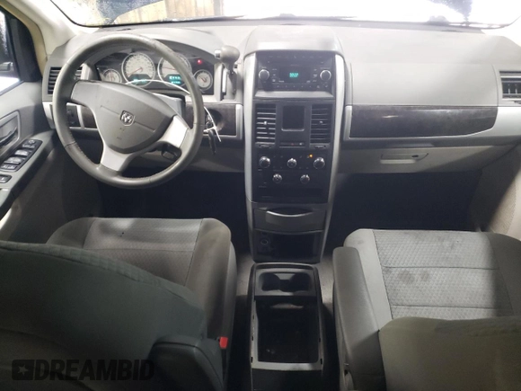 2010 Dodge Grand Caravan SXT with VIN 2D4RN5D15AR140564, listed as a Copart auction lot 52735825 with 187,744 mi miles and Salvage Title. Bid and sale history available at DreamBid. Image 8.