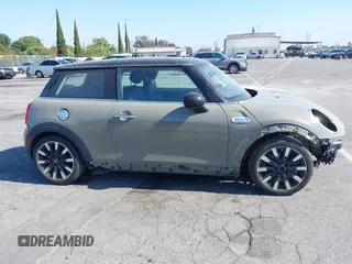 2019 MINI Hardtop Cooper S z VIN WMWXP7C51K2A50911, wystawiony jako IAAI lot #42194823 z przebiegiem 32 820 mil mil oraz . Historia ofert i sprzedaży dostępna na DreamBid. Obrazek 14.