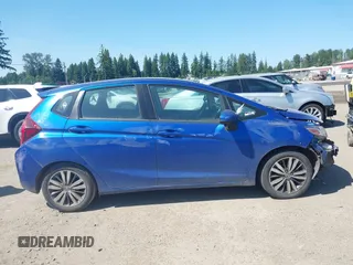 2015 Honda Fit EX-L z VIN 3HGGK5H85FM745849, wystawiony jako IAAI lot #42443790 z przebiegiem 93 488 mil mil oraz . Historia ofert i sprzedaży dostępna na DreamBid. Obrazek 14.