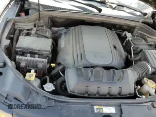 2018 Jeep Grand Cherokee Sterling with VIN 1C4RJFBT4JC181277, listed as a Copart auction lot 61384045 with 138,659 mi miles and Salvage title. Bid and sale history available at DreamBid. Image 13.